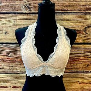 Light pink over the neck, open back bralette